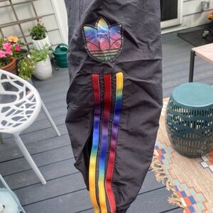Rainbow stripe Adidas track pants, women’s size small